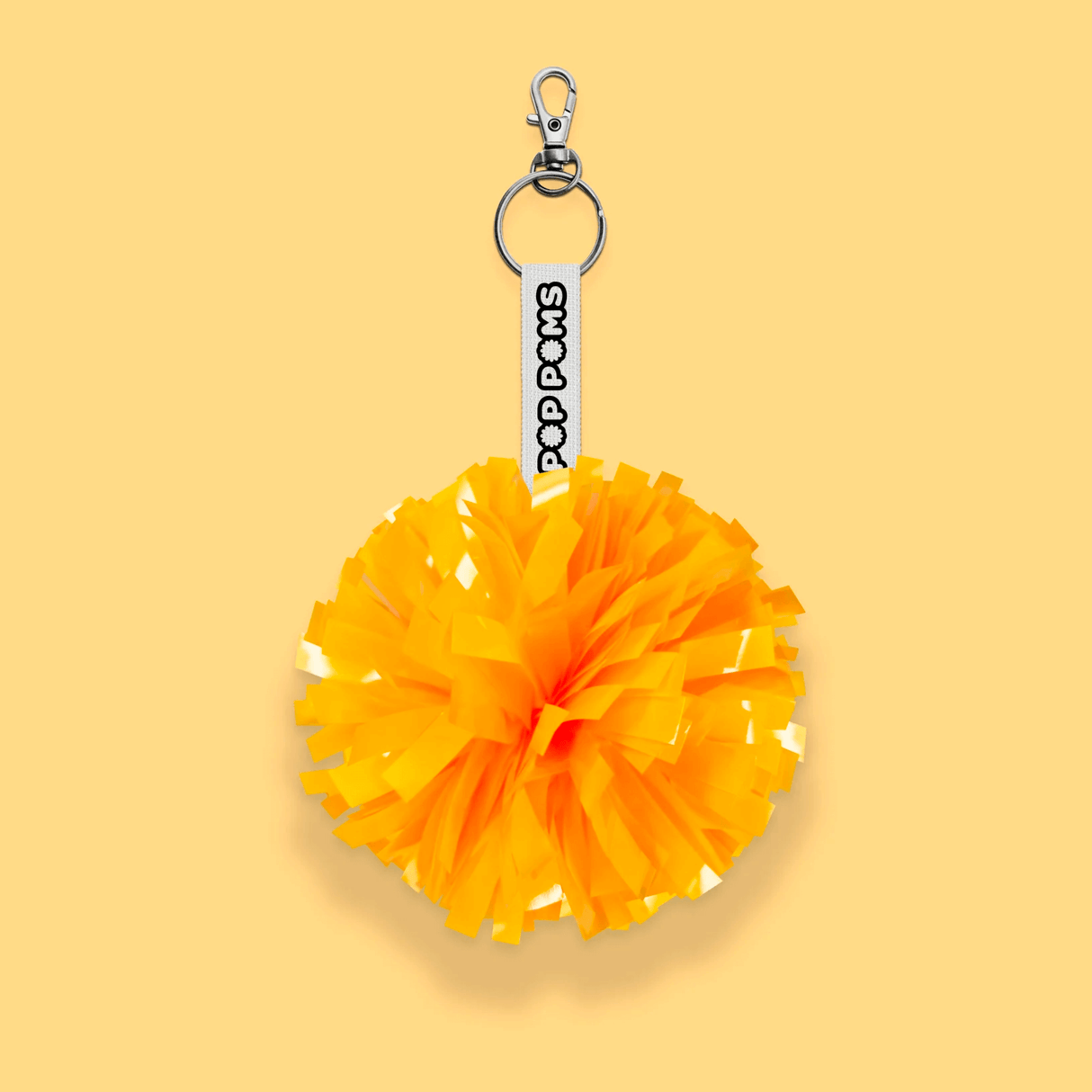 Ananasgul metallic pom pom-nyckelring